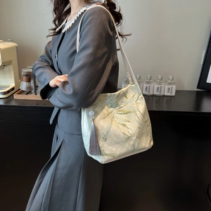 Minimalist Chinese style tote bag with bamboo embroidery and grey tassel detail