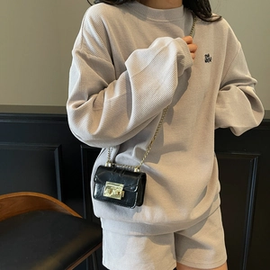 Ensemble chic en tricot gaufré lavande avec sweat-shirt et short pour le printemps