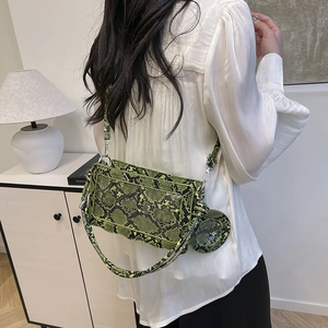 Chic snakeskin texture crossbody bag with wide strap and matching mini pouch for women