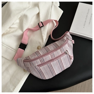 Detail of pink and grey striped waist bag with double zippers and adjustable strap