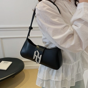 Retro black leather underarm bag with silver PH metal buckle and knot strap detail
