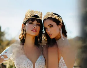 Detailed view of matte gold Baroque leaf bridal crown and headband on models