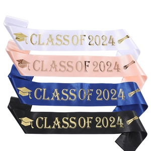 Detail of satin graduation sashes with gold Class of 2024 print in four colors