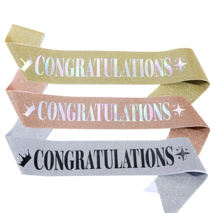 Detailed S-curve display of glitter congratulations sashes in gold, rose gold and silver