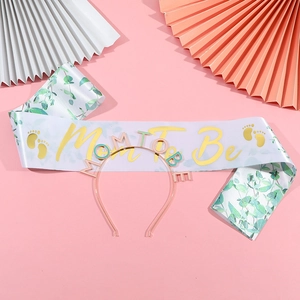 Rose gold Mom To Be headband and floral satin sash set for baby shower celebrations