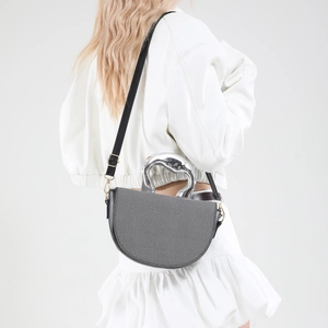 Minimalist grey tweed saddle bag with artistic silver metal handle and leather strap