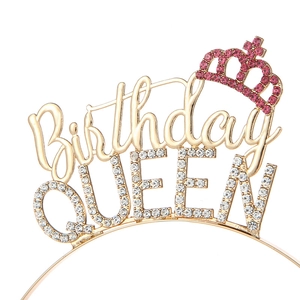 Detail of golden Birthday Queen headband with pink rhinestones and crown accents