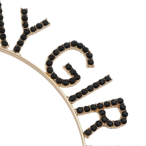Macro detail of Birthday Girl headband featuring black rhinestones on gold alloy frame