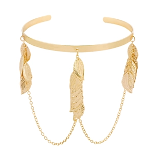 Golden baroque leaf arm cuff with delicate tassel chains in a goddess style design