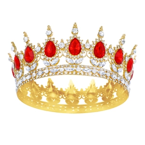 Detailed close-up of golden baroque bridal crown featuring red teardrop crystals