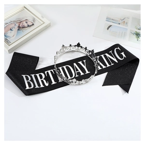 Detail of silver alloy crown and black glitter Birthday King sash for men birthday