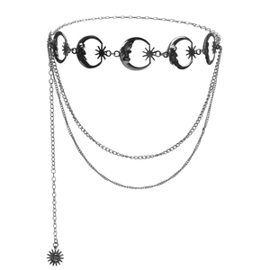 Silver gothic waist chain with engraved moon and star pendants in a layered punk style