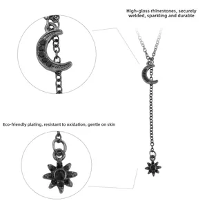 Macro detail of gothic celestial necklace with black rhinestones and gunmetal plating