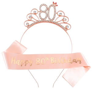 Pink 80th birthday party set with rose gold rhinestone tiara and satin sash decoration