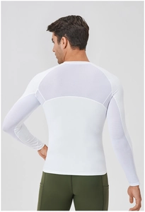 Close-up of white compression t-shirt featuring breathable mesh panels on back and sleeves