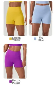 Detail view of high waist athletic shorts in Marigold Yellow, Air Blue, and Electric Purple