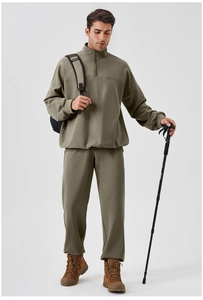Men's olive green outdoor sports suit with half-zip sweatshirt and loose-fit jogger pants