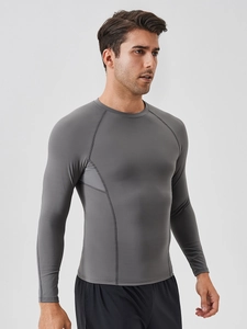 Men's dark grey compression long sleeve sports shirt with breathable mesh for training