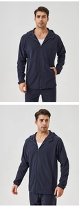 Vue avant et latérale de l'ensemble coupe-vent à capuche et jogging bleu marine pour homme
