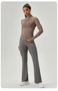 Damen Yoga-Oberteil mit halbem Reißverschluss und ausgestellte Hose mit Daumenlöchern