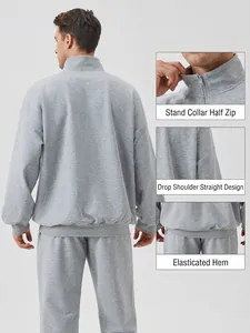 Men's loose light grey sports tracksuit with half-zip stand collar and drop shoulders