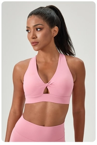 Pink cross neck sports bra with front twist hollow detail and high waist yoga pants