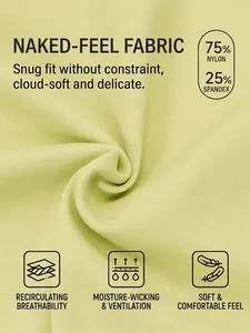 Haut de yoga vert clair respirant en tissu technique 75% nylon et 25% élasthanne