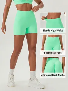 Women's high waist mint green yoga shorts with scrunch butt lift and seamless front