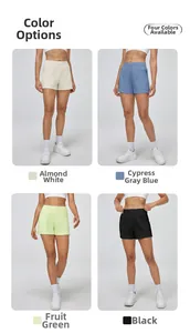 Détails du short de sport taille haute en blanc amande, bleu cendré, vert fruit et noir