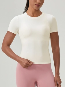 T-shirt de yoga ivoire pour femme avec coupe ajustée, col rond et tissu extensible