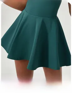Detail of a dark teal A-line athletic skirt with fluid drapes and high elasticity fabric