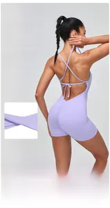 Detail view of lavender yoga bodysuit with crisscross back straps and ruching