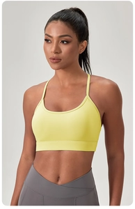 Vue arrière du soutien-gorge de sport jaune clair avec doubles bretelles en Y