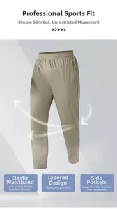 Detail of khaki jogger pants showing elastic waist and side pockets for men's fitness