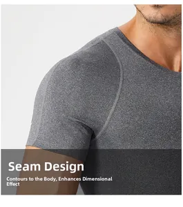 Detail of grey compression t-shirt showing flatlock seams and athletic mesh fabric texture