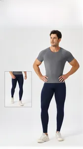 Men's compression t-shirt set for fitness training with grey top and navy leggings