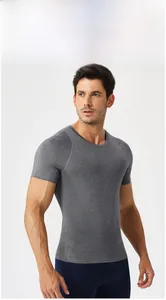 Close-up of tight men's sport shirt with flatlock seams and breathable grey fabric