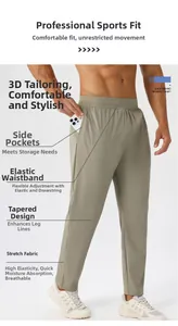 Detail of men's quick-dry sports trousers with elastic drawstring waist and tapered fit