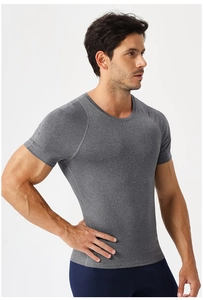 Men's compression t-shirt in heather grey with raglan sleeves and breathable fabric texture
