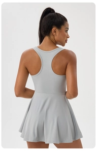 Detail of light grey racerback tennis dress with flared A-line skirt for athletic use