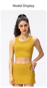 Detail of ribbed ginger yellow yoga top and matching leggings with side pockets