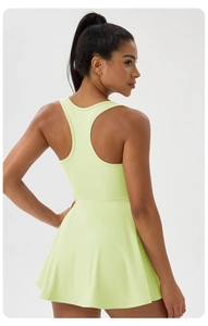 Detail view of the racerback design on this breathable lime green athletic tennis dress