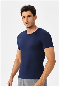 Detailed close-up of navy blue compression T-shirt showing high-elasticity breathable fabric