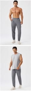 Detail of breathable men's sports joggers with elastic drawstring waist and loose fit
