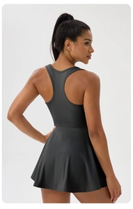 Close-up of racerback detail and breathable fabric on charcoal tennis dress for women