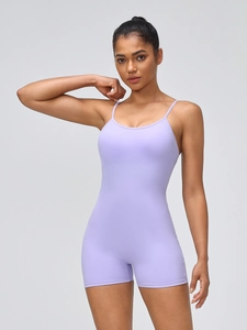 Slim fit light purple yoga bodysuit with thin straps and peach hip design for fitness
