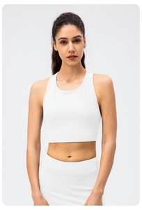 Detail of white ribbed knit yoga vest featuring high elasticity and breathable racerback design