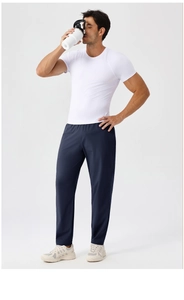 Men's breathable quick-dry sports pants paired with slim white t-shirt and sneakers
