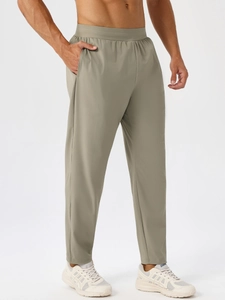Men's breathable quick-dry sports pants in olive green for fitness and running