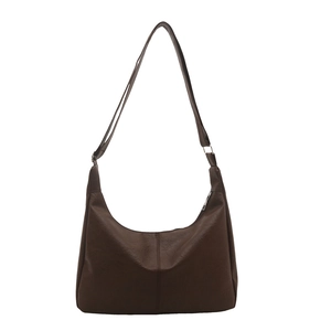 Minimalist dark brown hobo shoulder bag in pebble grain faux leather with adjustable strap